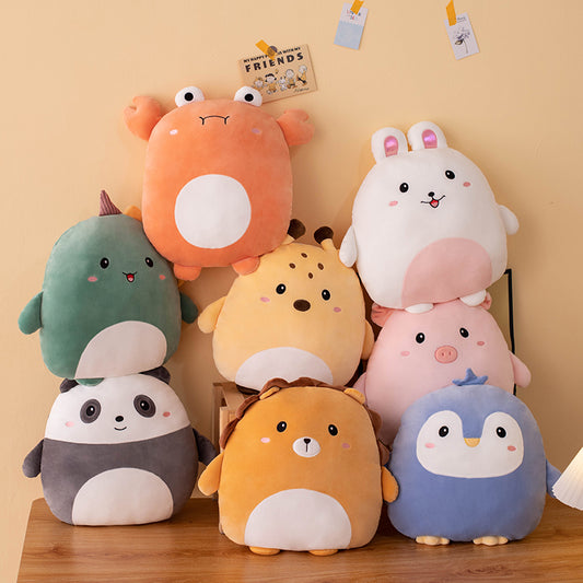 Stack of colorful cute plush toys against a beige wall with 'Friends' poster.