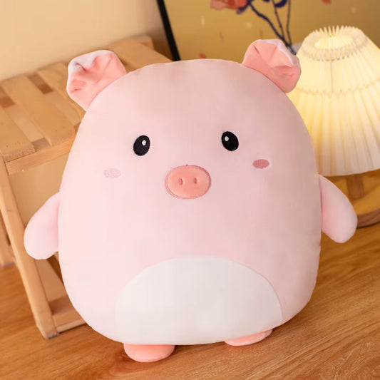 Cute plush pig toy on a wooden floor with a lamp in the background